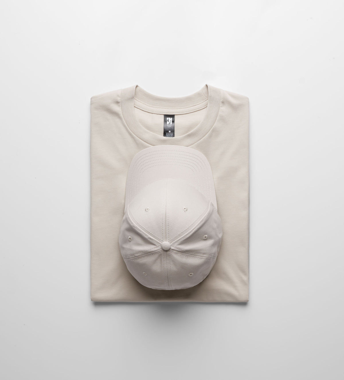 A beige cotton classic heavyweight t-shirt with subtle stitching and matching cap perfect for workwear uniforms