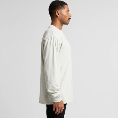 Cream-colored long-sleeved shirt with a relaxed fit and puff sleeves.
